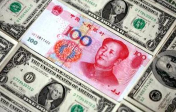 Официальный курс юаня к доллару установил новый минимум