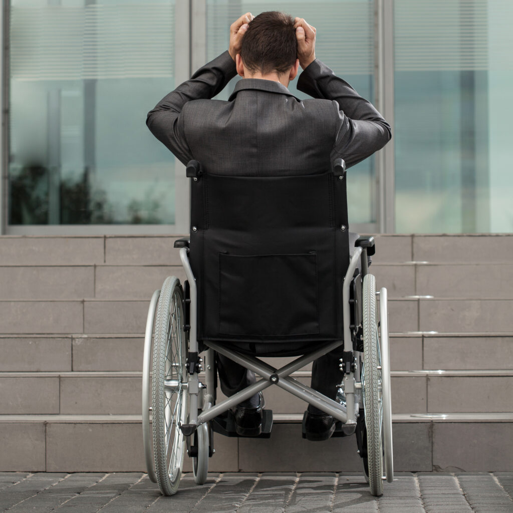 A disabled businessman having problems with getting to workplace