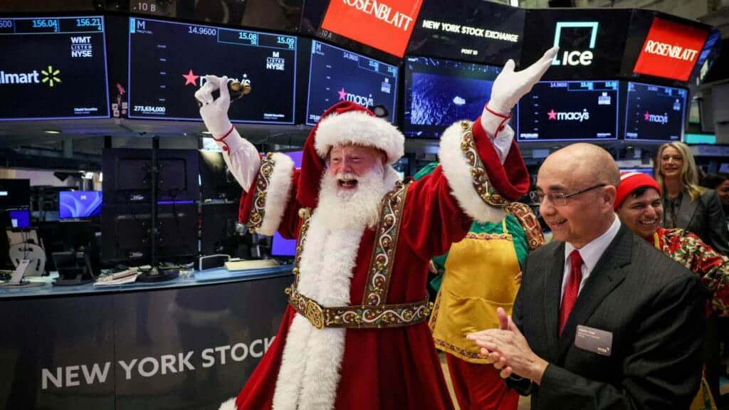 FILE PHOTO: Macy's Santa Claus appears on the trading floor to celebrate the 97th Macy's Thanksgiving Day Parade at the New York Stock Exchange (NYSE) in New York City, U.S., November 22, 2023.  REUTERS/Brendan McDermid/File Photo