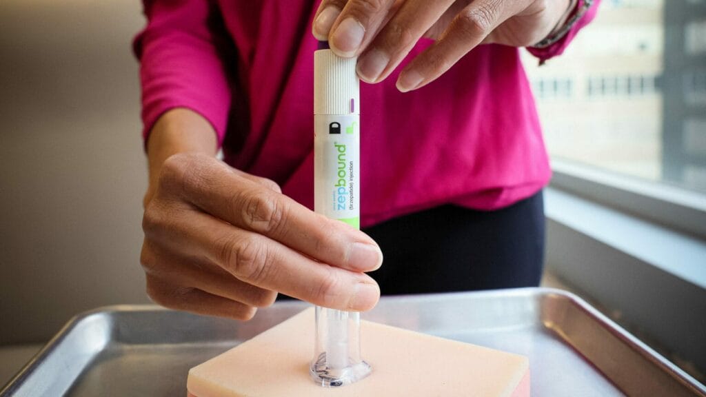 An injection pen of Zepbound, Eli Lilly’s weight loss drug, is displayed in New York City, U.S., December 11, 2023.  REUTERS/Brendan McDermid