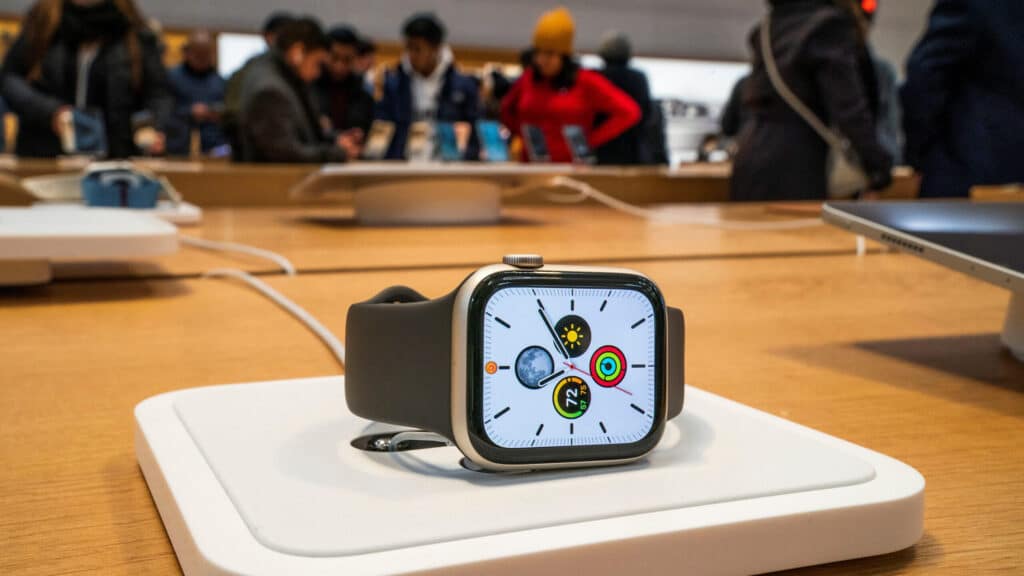 An Apple smartwatch is displayed as customers visit the Apple store in New York, U.S., December 26, 2023. REUTERS/Eduardo Munoz