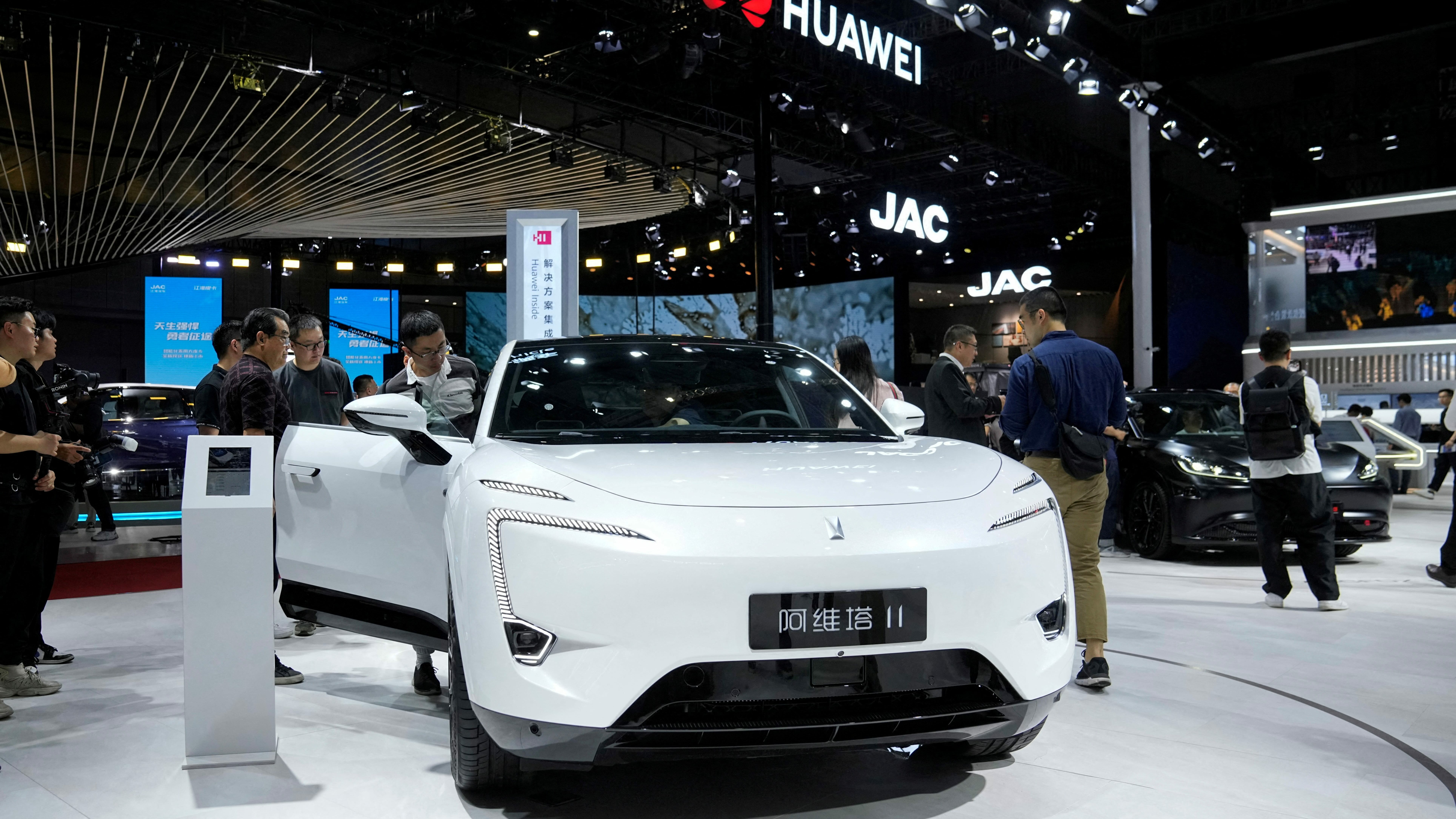 FILE PHOTO: An Avatr 11 electric vehicle, powered by Huawei Inside intelligent solution, is displayed at the Auto Shanghai show, in Shanghai, China April 18, 2023. REUTERS/Aly Song/File Photo