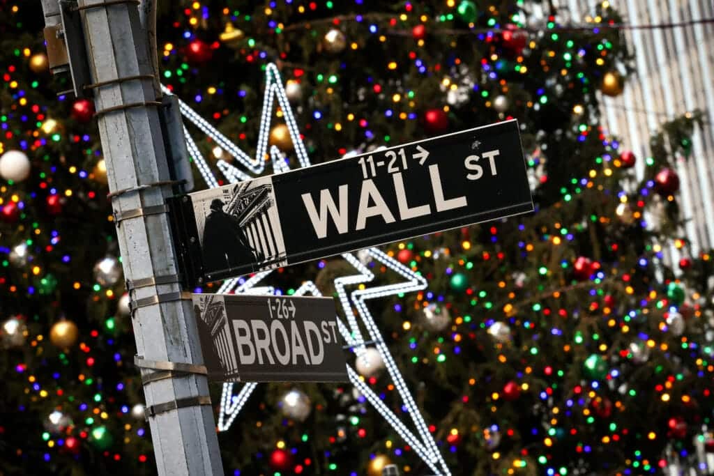 A Christmas tree is seen outside of the New York Stock Exchange (NYSE) at Wall St and Broad St. in New York City, U.S., December 13, 2023.  REUTERS/Brendan McDermid