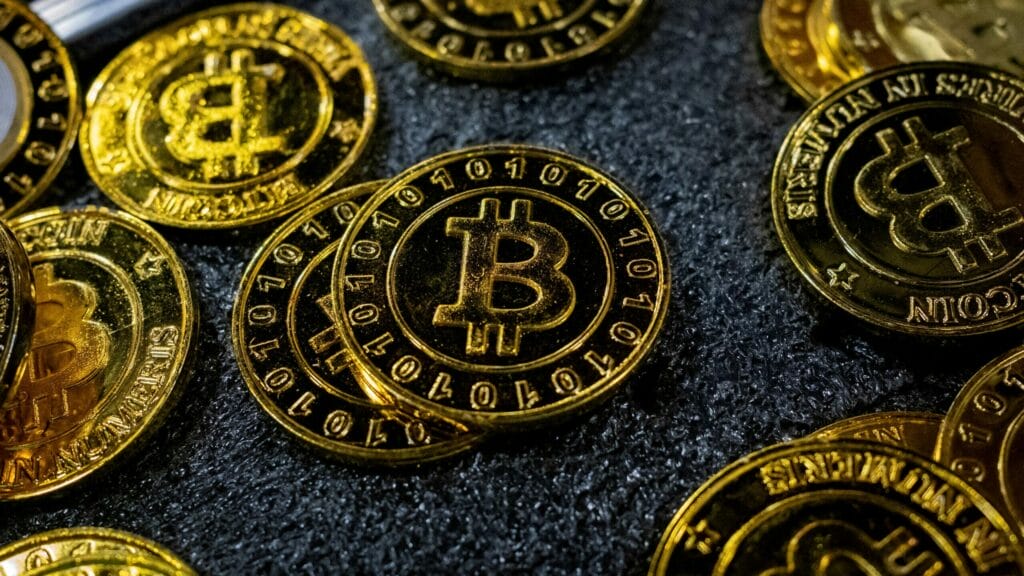 FILE PHOTO: Bitcoin coins are seen at a stand during the Bitcoin Conference 2023, in Miami Beach, Florida, U.S., May 19, 2023. REUTERS/Marco Bello/File Photo