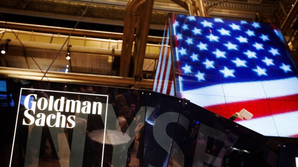 FILE PHOTO: The Goldman Sachs logo is displayed on a post above the floor of the New York Stock Exchange, September 11, 2013. REUTERS/Lucas Jackson/File Photo