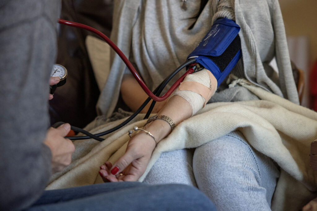 Marinika Tepic, one of the leaders of the Party of Freedom and Justice and the opposition 'Serbia Against Violence' (SPN) coalition, has her blood pressure checked at the state election commission headquarters where she is on a hunger strike on the ninth day, after opposition alleged major election law violations in the Belgrade city and parliament races, in Belgrade, Serbia, December 26, 2023. REUTERS/Marko Djurica