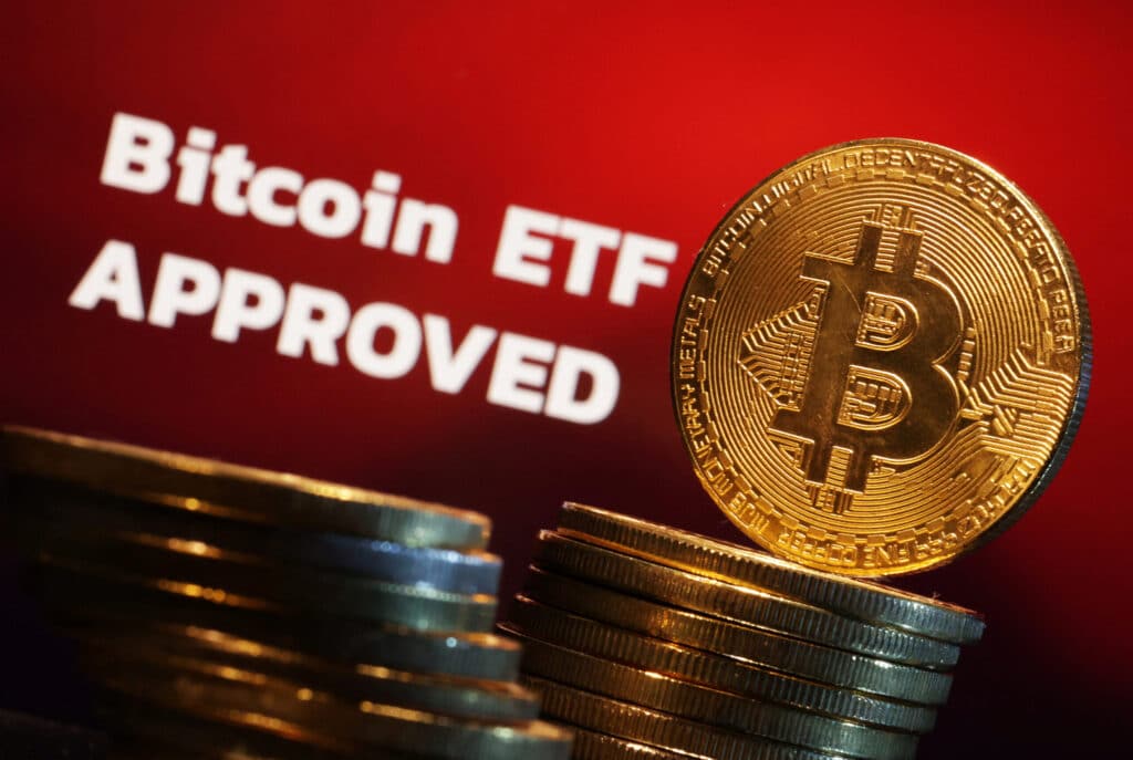 Representation of Bitcoin cryptocurrency and "Bitcoin ETF Approved" words are seen in this illustration taken January 11, 2024. REUTERS/Dado Ruvic/Illustration
