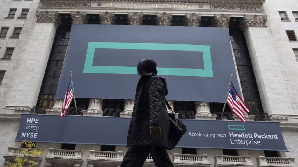 FILE PHOTO: Signs for Hewlett Packard Enterprise Co., cover the facade of the New York Stock Exchange November 2, 2015. Shares of HP Inc., the legacy printer and PC business of the former Hewlett-Packard Co, soared as much as 11 percent in early trading on Monday, outpacing those of Hewlett Packard Enterprise Co. , the new company that holds the tech pioneer's corporate hardware and services division.   REUTERS/Brendan McDermid/File Photo