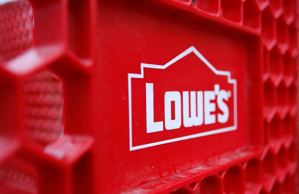FILE PHOTO: The Lowes logo is displayed on a shopping cart outside of a store in Scottsdale, Arizona, February 22, 2010.     REUTERS/Joshua Lott/File Photo