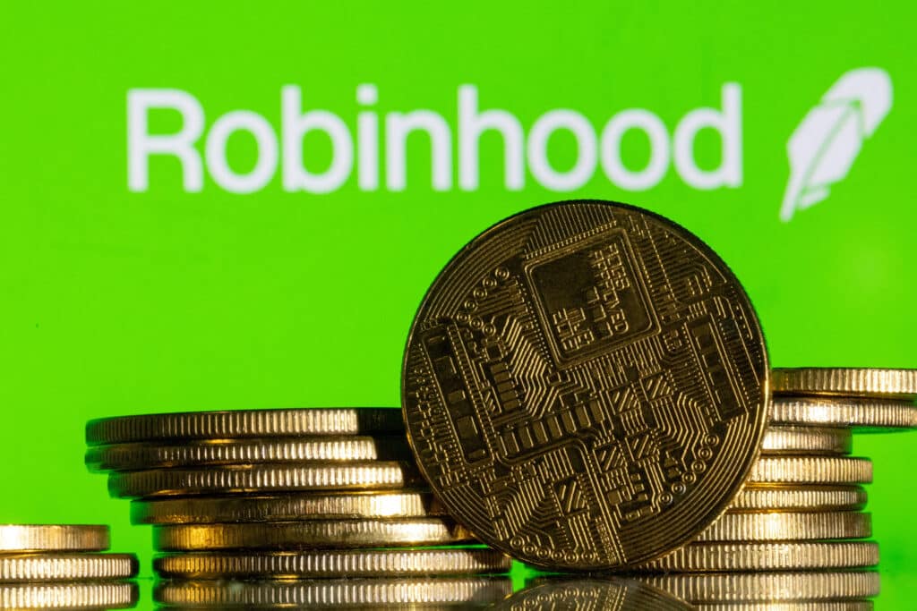 FILE PHOTO: Robinhood logo and representations of cryptocurrency are seen in this illustration taken December 12, 2023. REUTERS/Dado Ruvic/Illustration/File Photo