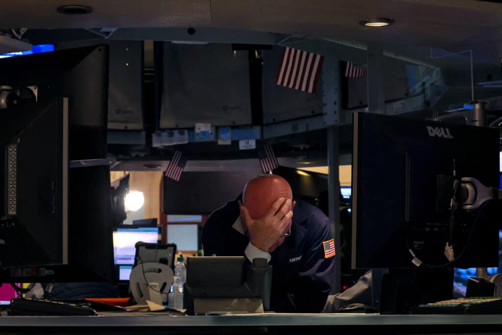 A specialist traders works at his post on the floor at the New York Stock Exchange (NYSE) in New York City, U.S., June 12, 2024.  REUTERS/Brendan McDermid