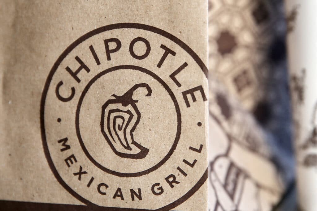 FILE PHOTO: A logo of Chipotle Mexican Grill is seen on one of their bags in Manhattan, New York November 23, 2015. REUTERS/Andrew Kelly/File Photo