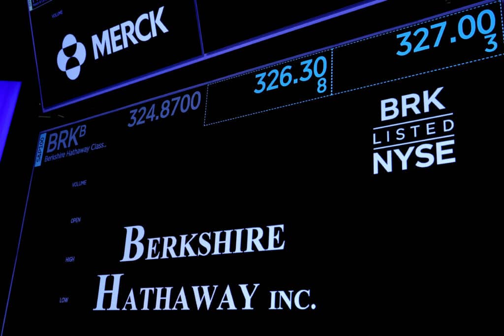 FILE PHOTO: Trading information and logo for Berkshire Hathaway are displayed on a screen on the floor of the New York Stock Exchange in New York City, U.S., May 10, 2023.  REUTERS/Brendan McDermid/File Photo