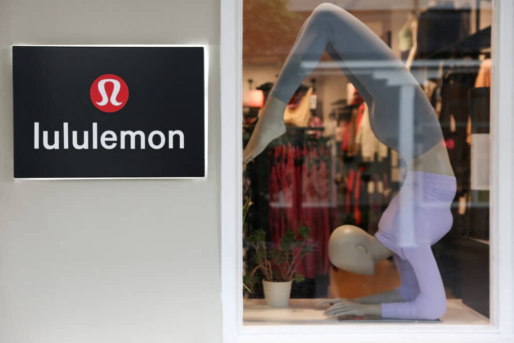 A logo is displayed outside a Lululemon outlet retail store at Bicester Village in Oxfordshire, Britain, August 21, 2024. REUTERS/Hollie Adams