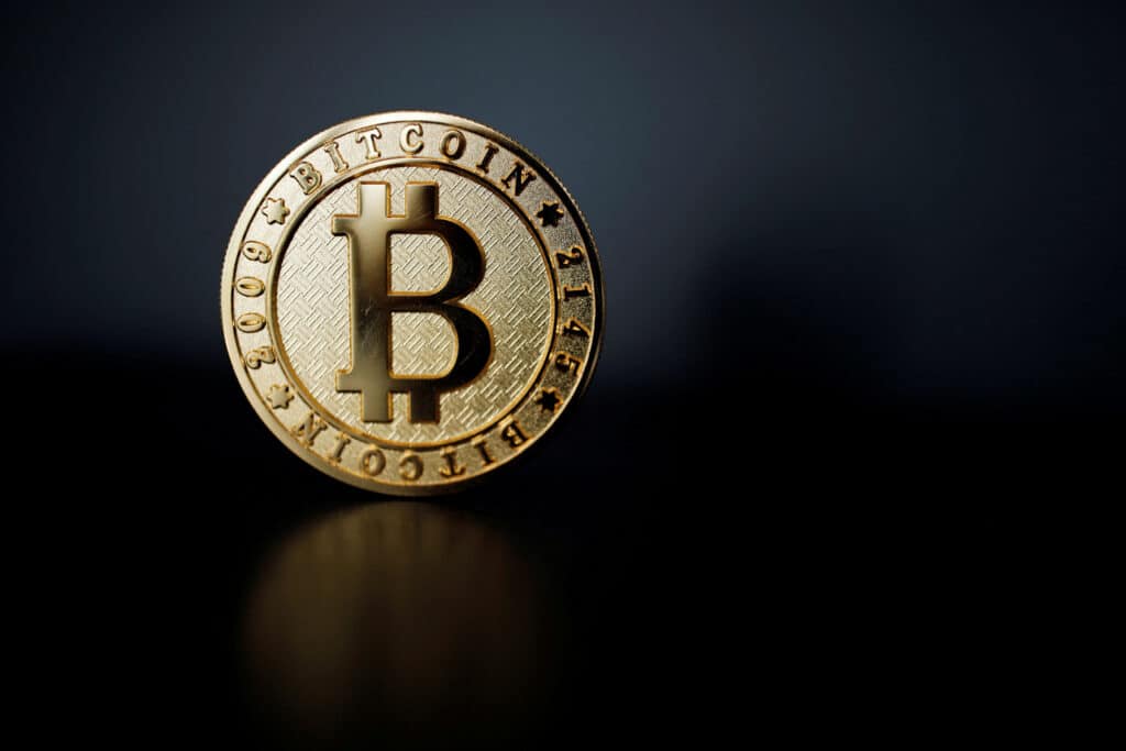 FILE PHOTO: A bitcoin is seen in an illustration picture taken at La Maison du Bitcoin in Paris, France, June 23, 2017. REUTERS/Benoit Tessier/File Photo