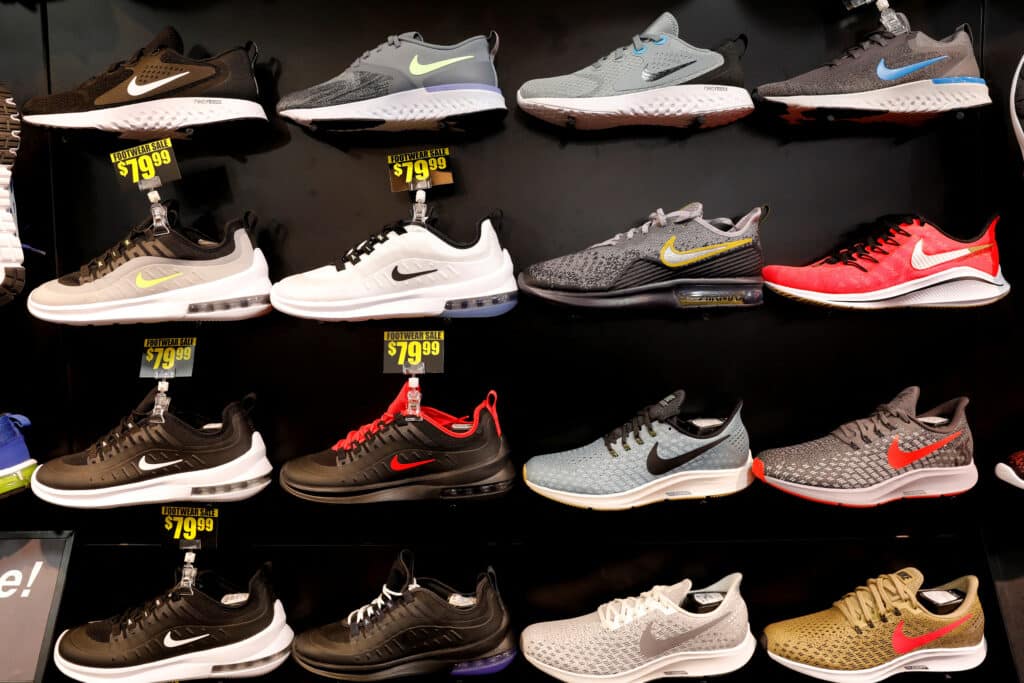 FILE PHOTO: Nike shoes are seen displayed at a sporting goods store in New York City, New York, U.S., May 14, 2019. REUTERS/Mike Segar/File Photo