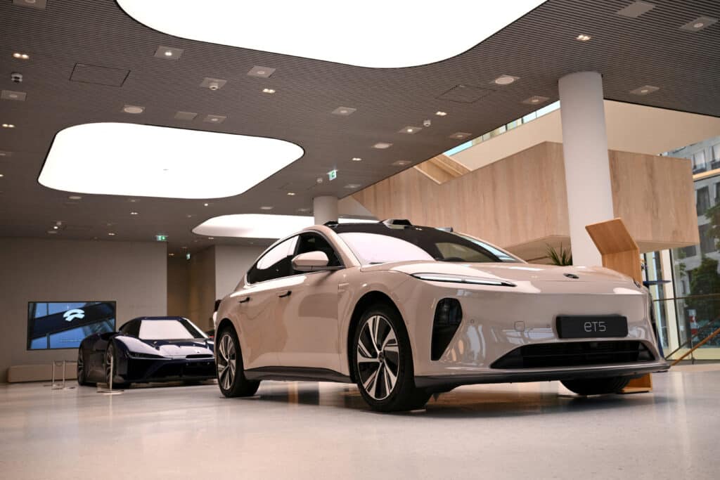 FILE PHOTO: A NIO ET5 car model and the NIO EP9 sports car are pictured at the NIO House, the showroom of the Chinese premium smart electric vehicle manufacture NIO Inc. in Berlin, Germany August 17, 2023. REUTERS/Annegret Hilse/File Photo