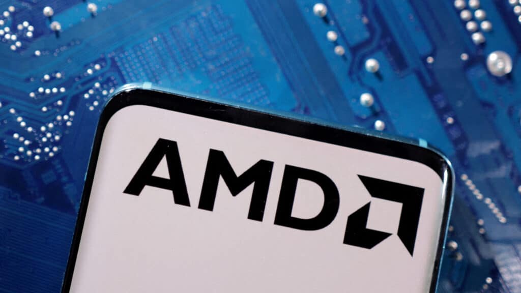 FILE PHOTO: A smartphone with a displayed AMD logo is placed on a computer motherboard in this illustration taken March 6, 2023. REUTERS/Dado Ruvic/Illustration/File Photo