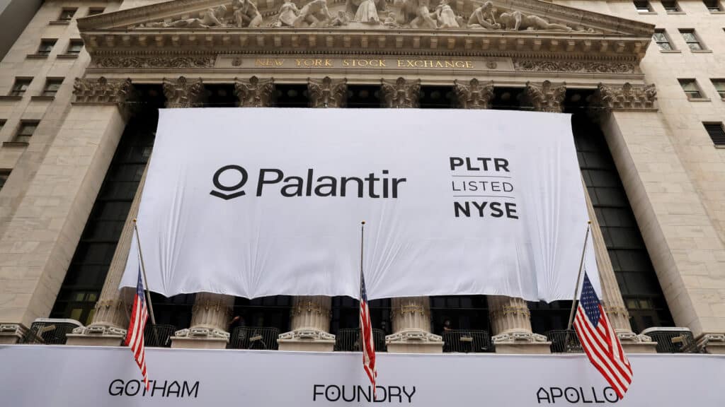 FILE PHOTO: A banner featuring the logo of Palantir Technologies (PLTR) is hung at the New York Stock Exchange (NYSE) on the day of their initial public offering (IPO) in Manhattan, New York City, U.S., September 30, 2020. REUTERS/Andrew Kelly/File Photo