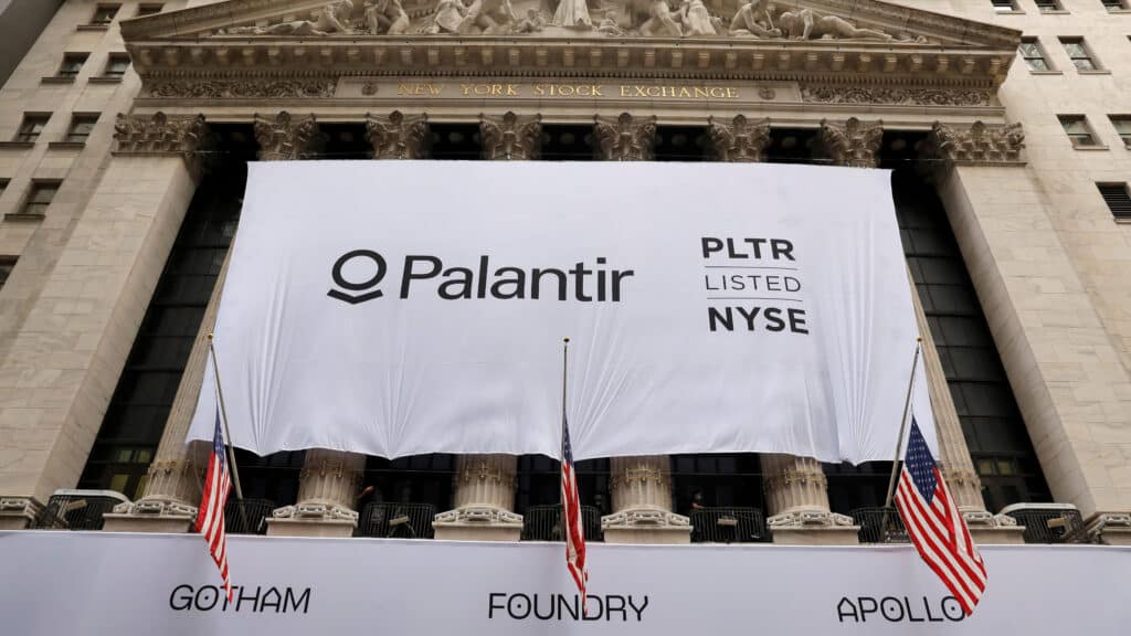 FILE PHOTO: A banner featuring the logo of Palantir Technologies (PLTR) is hung at the New York Stock Exchange (NYSE) on the day of their initial public offering (IPO) in Manhattan, New York City, U.S., September 30, 2020. REUTERS/Andrew Kelly/File Photo