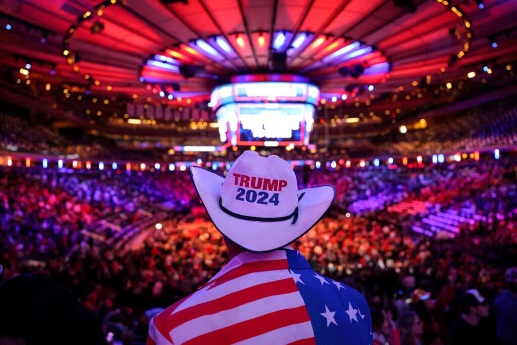 FILE PHOTO: A person wears a Trump-themed cowboy hat, on the day of a rally for Republican presidential nominee and former U.S. President Donald Trump, at Madison Square Garden, in New York, U.S., October 27, 2024. REUTERS/Andrew Kelly/File Photo