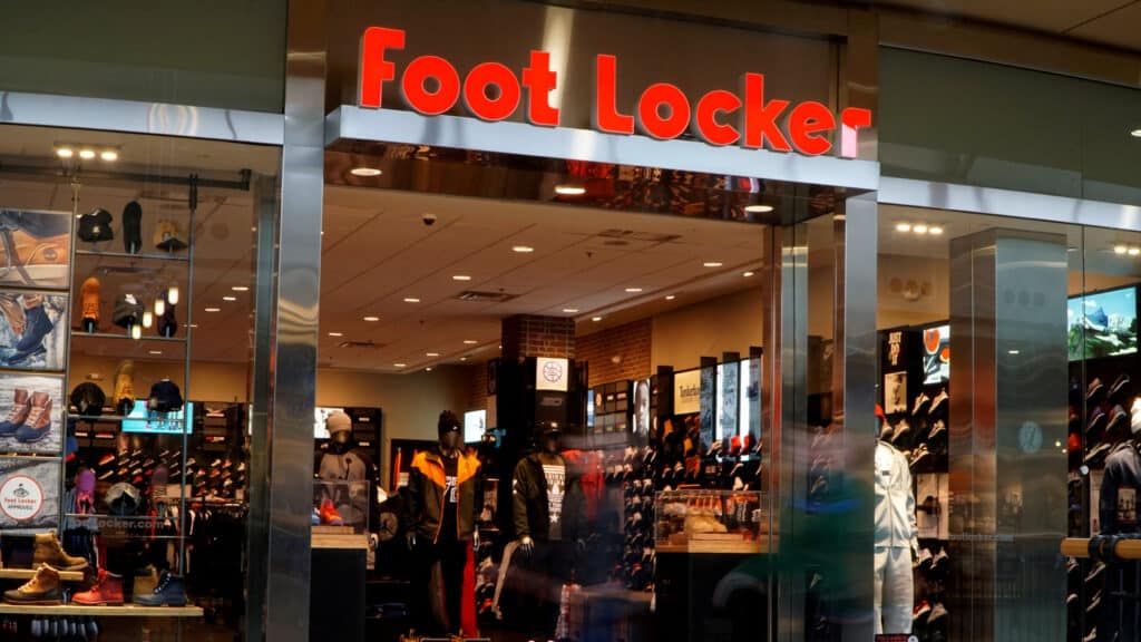 FILE PHOTO: Customers walk by the Foot Locker store in Broomfield, Colorado in a slow shutter exposure November 17, 2016.  REUTERS/Rick Wilking/File Photo