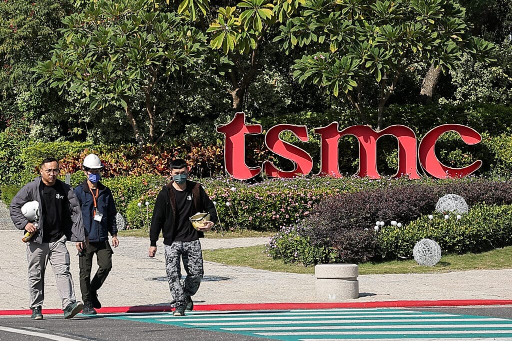 People walk across the streets in front of TSMC Fab 18 at Southern Taiwan Science Park in Tainan, Taiwan December 5, 2024. REUTERS/Ann Wang