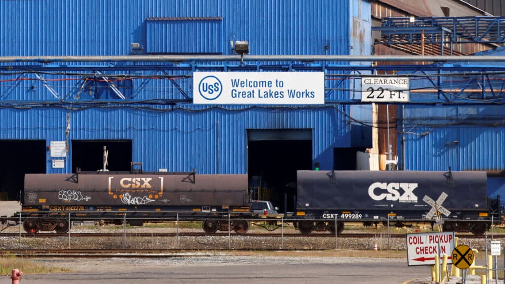 FILE PHOTO: Train cars are seen in front of the Great Lakes Works United States Steel plant in River Rouge, Michigan U.S., September 11, 2024. REUTERS/Rebecca Cook/File Photo