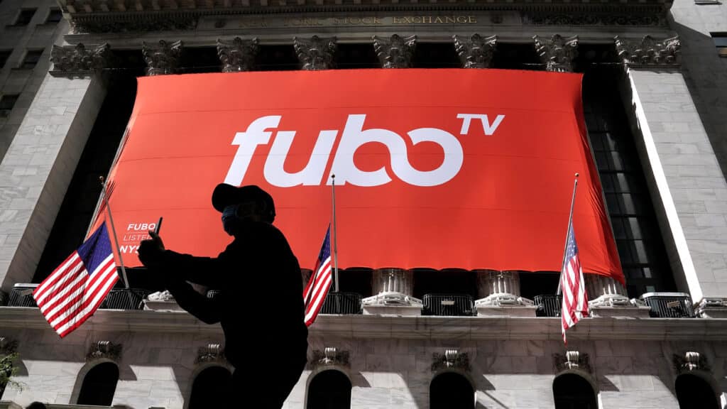 FILE PHOTO: The fuboTV logo is hung from the New York Stock Exchange on the day of its IPO in the Manhattan borough of New York City, New York, U.S., October 8, 2020. REUTERS/Carlo Allegri/File Photo