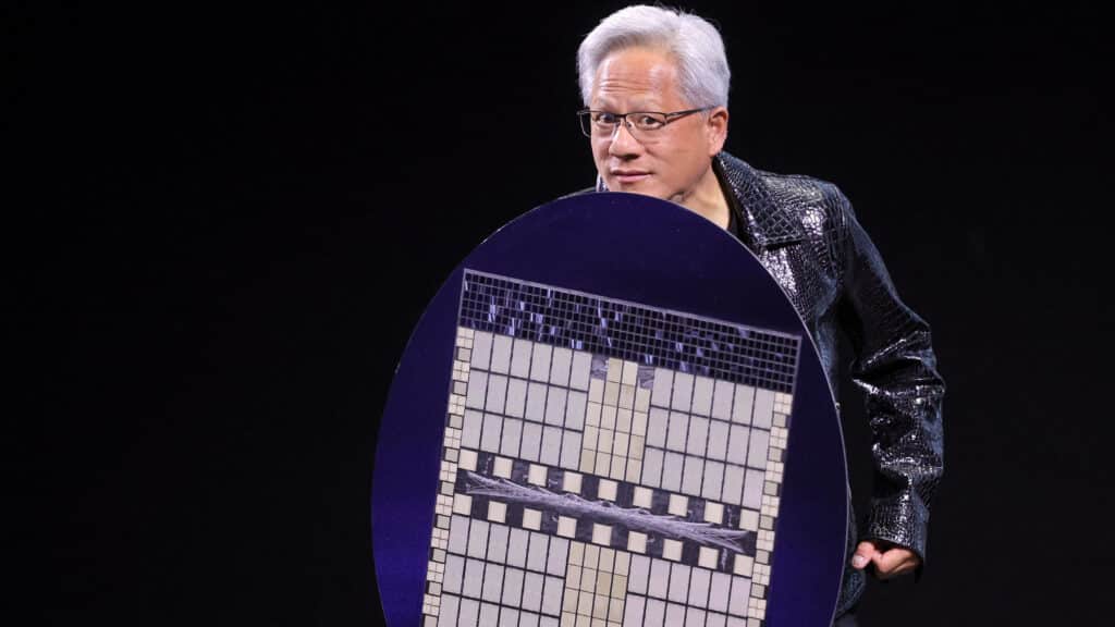 Nvidia CEO Jensen Huang holds a shield designed to look like a computer chip, as he gives a keynote address at CES 2025, an annual consumer electronics trade show, in Las Vegas, Nevada, U.S. January 6, 2025.  REUTERS/Steve Marcus