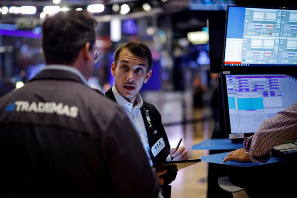 FILE PHOTO: Traders work on the floor at the New York Stock Exchange (NYSE) in New York City, U.S., September 9, 2024.  REUTERS/Brendan McDermid/File Photo/File Photo