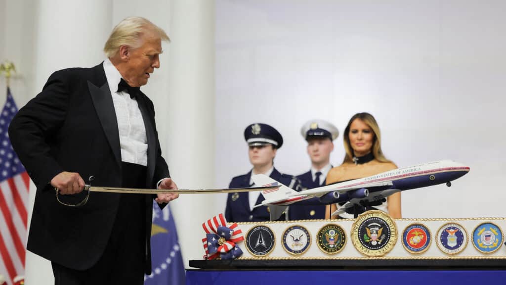 U.S. President Donald Trump cuts a cake with a sword during the Commander in Chief Ball in honor of the inauguration of U.S. President Donald Trump in Washington, U.S., January 20, 2025. REUTERS/Carlos Barria     TPX IMAGES OF THE DAY
