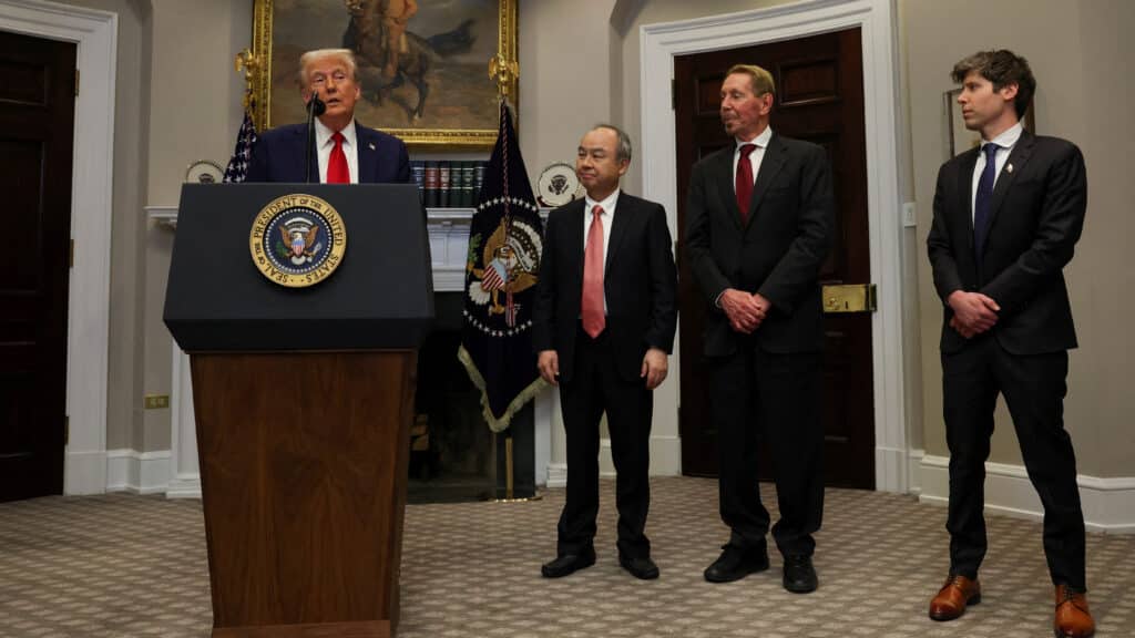 U.S. President Donald Trump delivers remarks on AI infrastructure, next to Oracle co-founder Larry Ellison, SoftBank CEO Masayoshi Son and OpenAI CEO Sam Altman at the Roosevelt room at White House in Washington, U.S., January 21, 2025.  REUTERS/Carlos Barria
