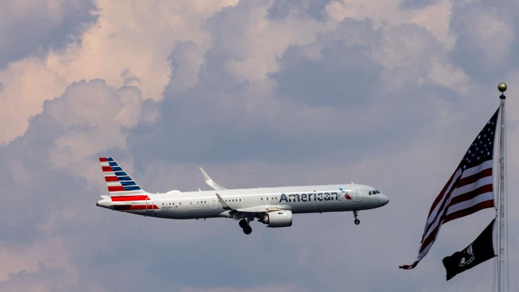 FILE PHOTO: An American Airlines commercial aircraft flies over Washington as it approaches to land at Dulles International Airport, as seen from Washington, U.S., August 5, 2024. REUTERS/ Umit Bektas/File Photo