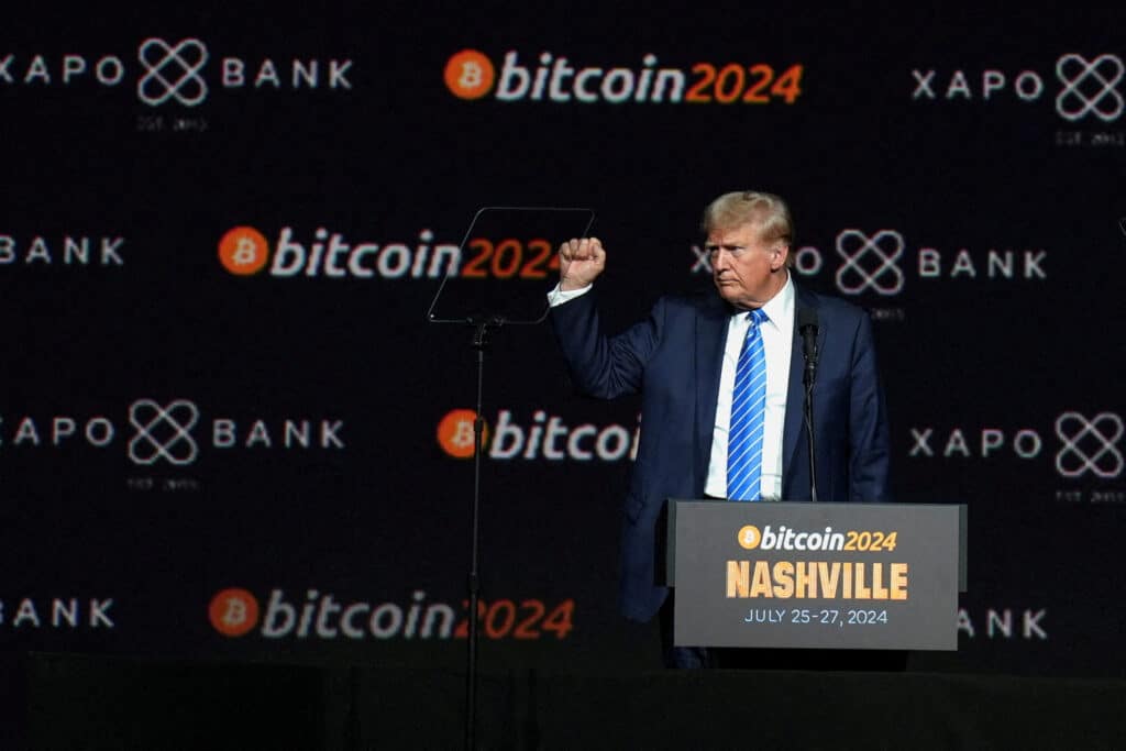FILE PHOTO: Then Republican presidential nominee and former U.S. President Donald Trump gestures at the Bitcoin 2024 event in Nashville, Tennessee, U.S., July 27, 2024. REUTERS/Kevin Wurm/File Photo
