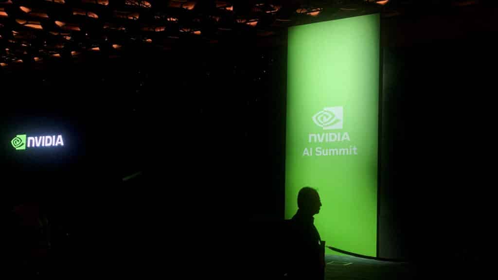 FILE PHOTO: A man walks past the Nvidia logo at the company's AI Summit in Mumbai, India, October 24, 2024. REUTERS/Arsheeya Bajwa/File Photo