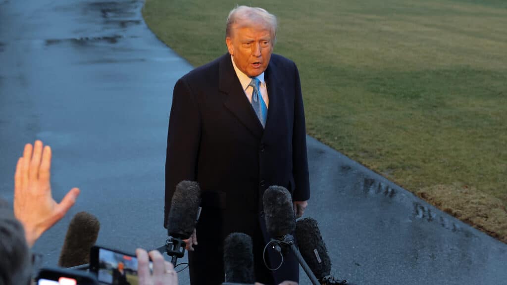 U.S. President Donald Trump speaks with members of the media as he departs the White House, in Washington, U.S., January 31, 2025. REUTERS/Carlos Barria