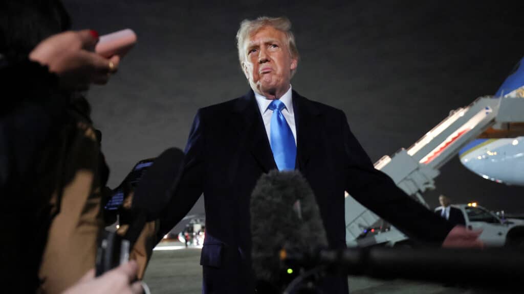 U.S. President Donald Trump speaks to reporters after stepping from Air Force One upon his return to Washington, at Joint Base Andrews in Maryland, U.S., February 2, 2025.  REUTERS/Kevin Lamarque