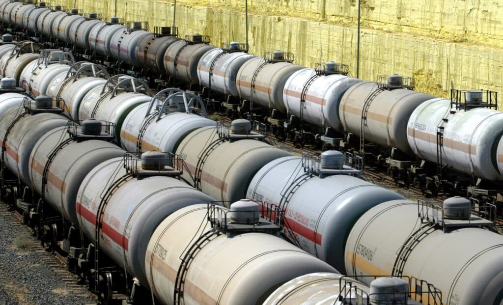 FILE PHOTO: Tank wagons stand in line next to sulphur stored at Tengiz oil and gas refinery plant in western Kazakhstan.  REUTERS/Shamil Zhumatov/File Photo