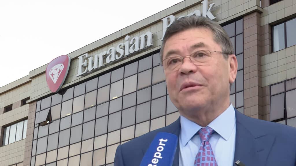 Патох Шодиев на фоне Евразийского банка 