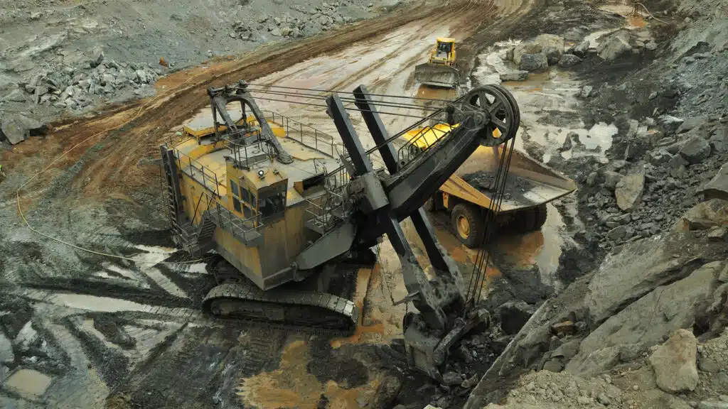 Industrial machines working in an iron ore mine