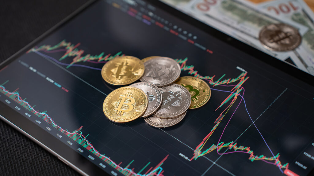 Bitcoin on the background of charts, green screen.Bitcoin under government pressure – regulations and taxation impact.