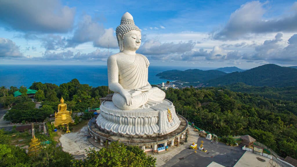 aerial view blue cloud over the Phuket big Buddha.
Phuket Big Buddha another tourist attraction of Phuket.
nature cloudscape sky and blue sea creative nature and travel concept.